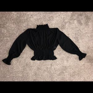 Black turtleneck blouse